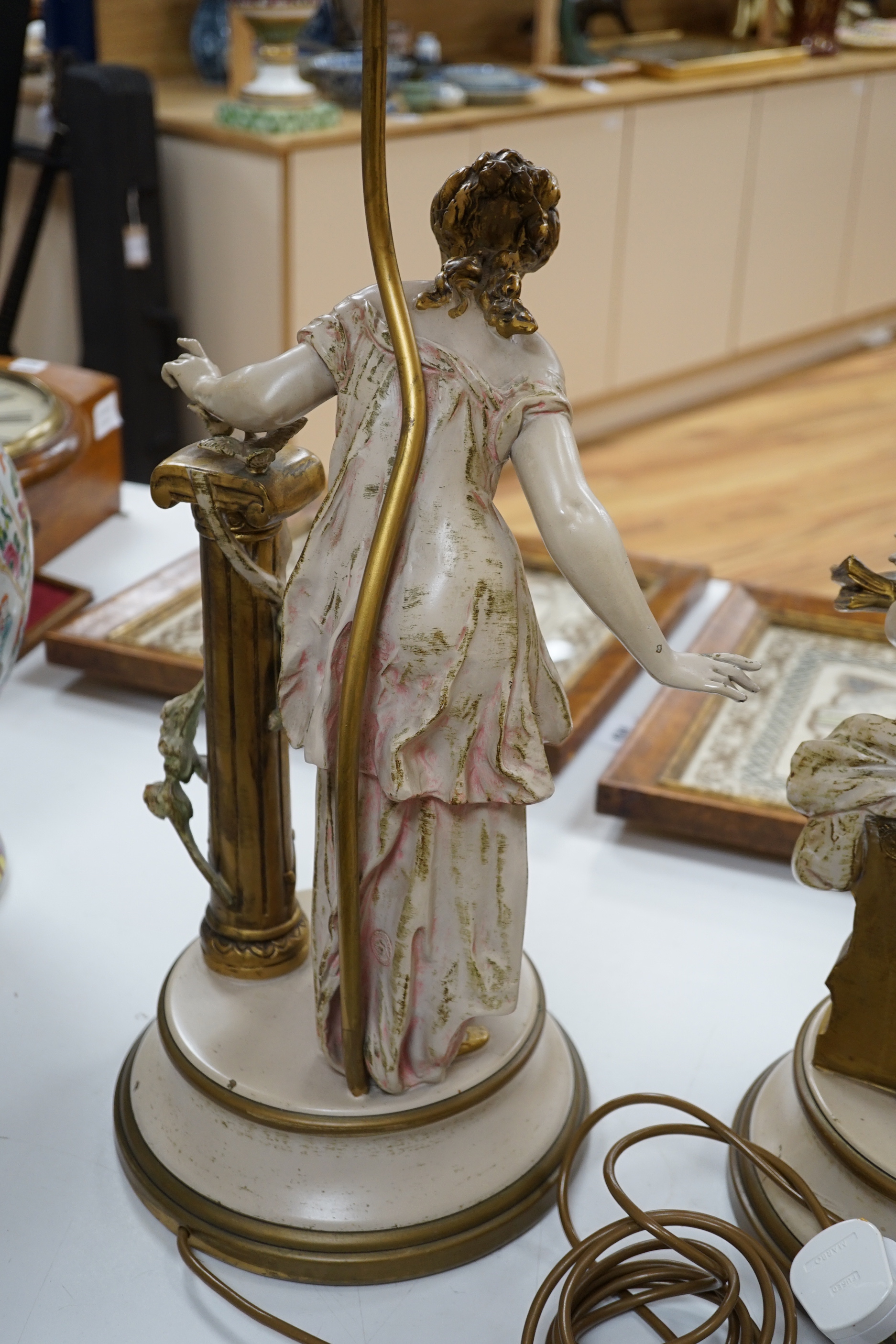 A pair of painted spelter figural table lamps, 82cm high including light fitting and shade